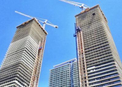 EDS high-rise project by the lake - 4x STROS dual construction hoist
