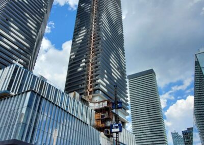 1 dual feeder construction lift up to one dual main construction lift at Sugar Wharf condos in Toronto